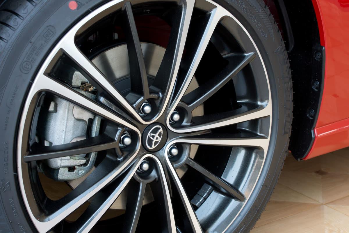 Disc brake and caliper behind an alloy wheel
