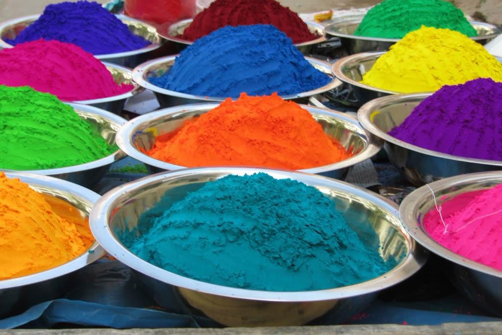 Bowls of vivid pigment powder